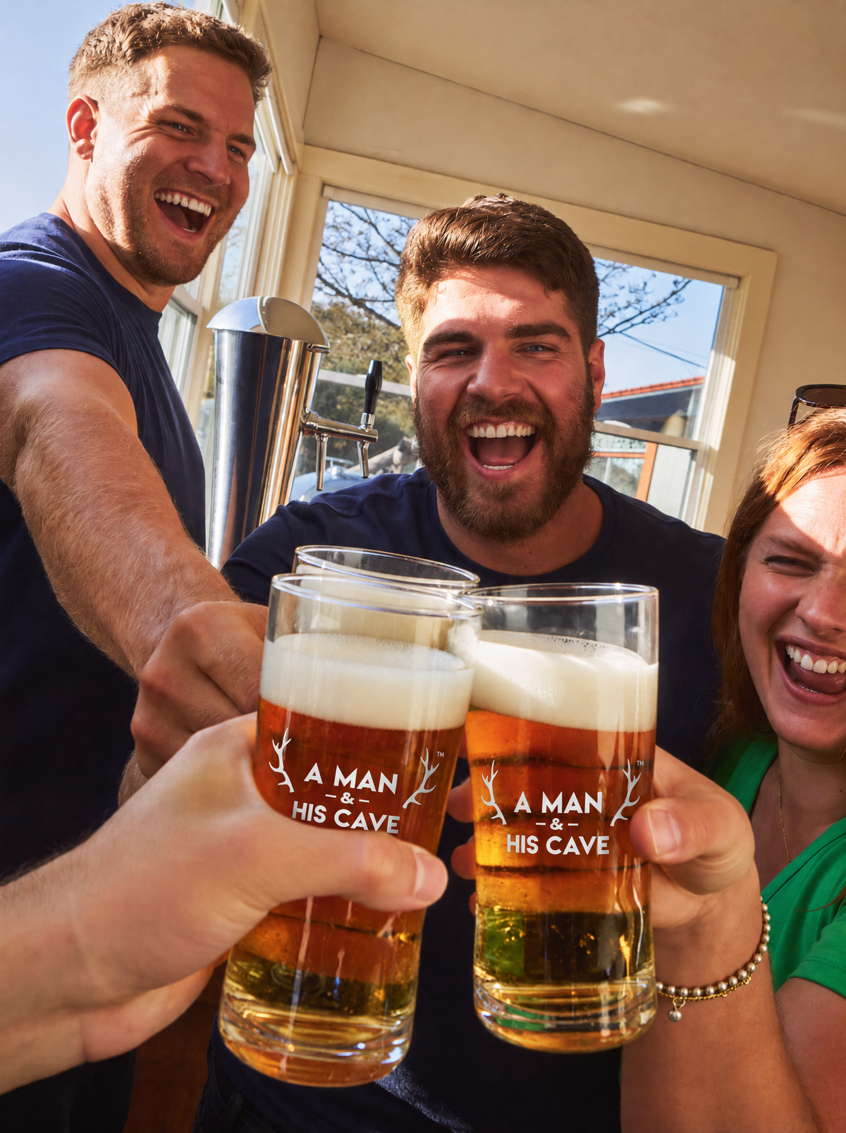 Mates cheersing AMAHC logo pint glasses at the home bar