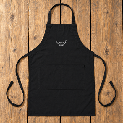 Black AMAHC logo BBQ apron laid flat on timber