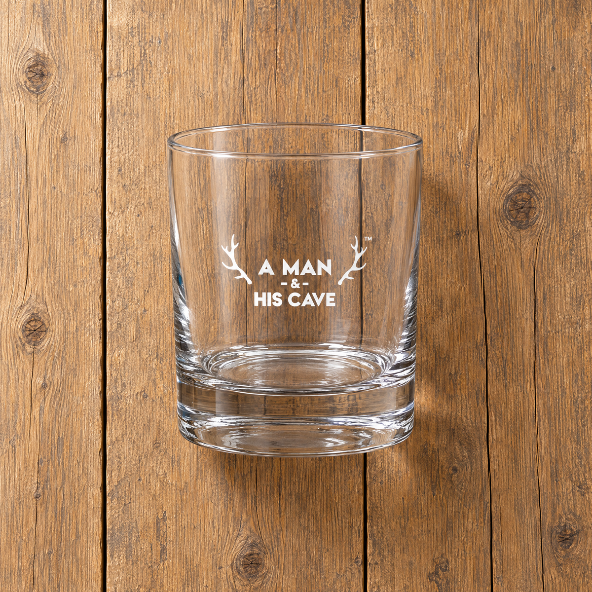 AMAHC logo whisky glass on timber