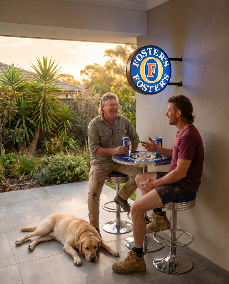 Fosters LED sign and stool set on the patio
